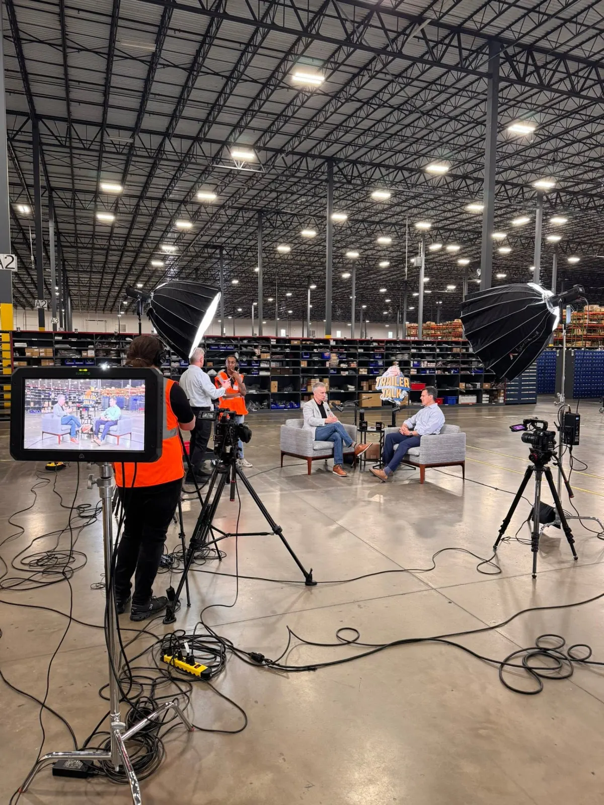 Interview filmed inside a large warehouse